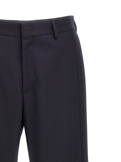 Trousers by Fendi for men in polyester & virgin wool blue features a tailored silhouette with a tailored , defined by its long and a sophisticated .