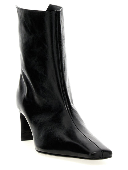 Ankle Boots by Khaite for women in calfskin leather black features an dynamic silhouette, showcasing the dynamic Women's Calfskin Leather Ankle Boots design with its distinctive and elegant square toe style.