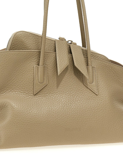 Medium Shoulder Bag by The Attico for women in calfskin leather beige & signature features a effortless chic silhouette with a secure zipper, ample external-pockets, and versatile shoulder-strap & handle for a effortless chic finish.