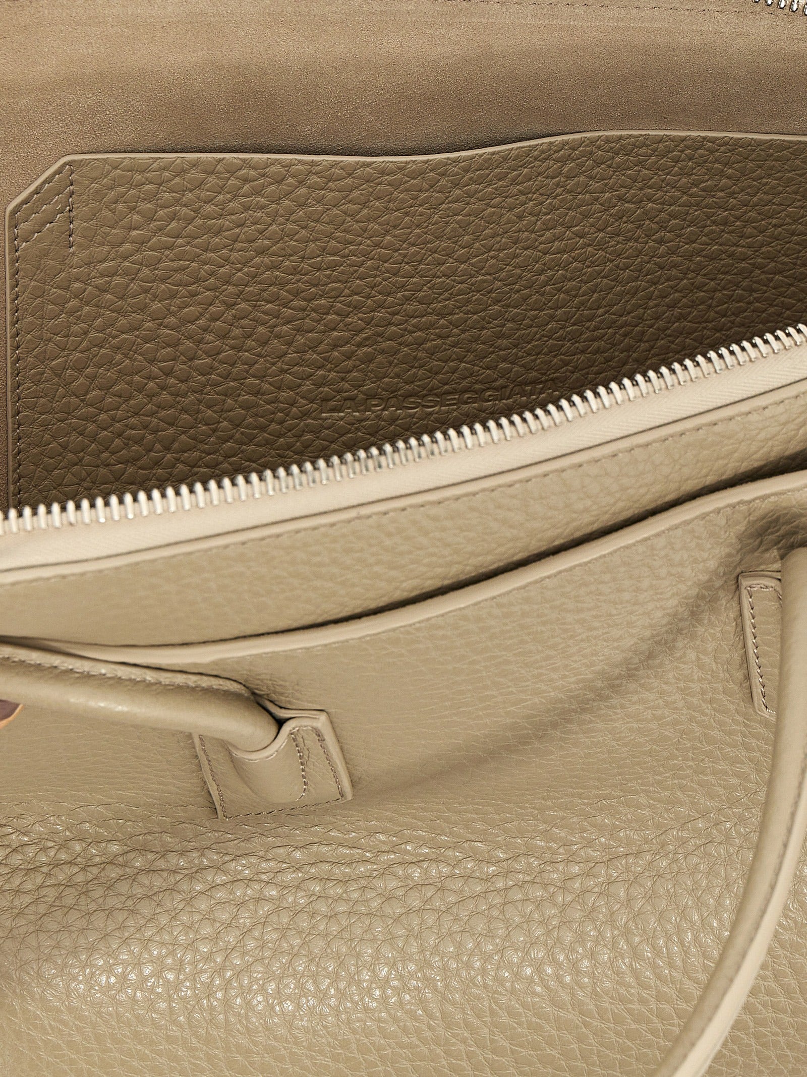 Medium Shoulder Bag by The Attico for women in calfskin leather beige & signature features a distinguished silhouette, showcasing a secure zipper and distinguished external-pockets with versatile shoulder-strap & handle for a distinguished finish.