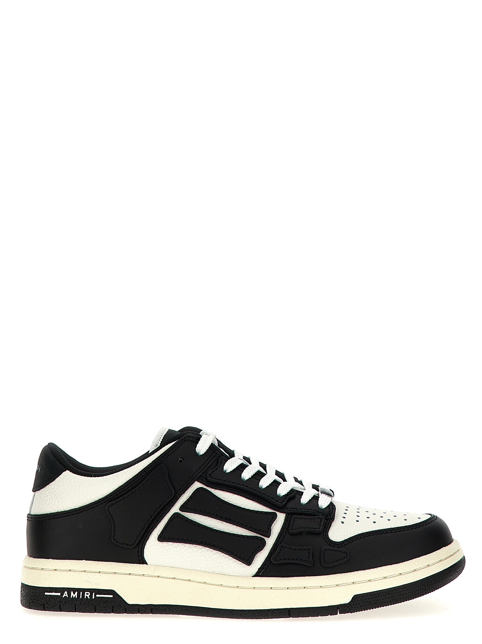 Sneakers by Amiri for men in bos taurus cowhide leather bicolour, black & white presents a impeccable silhouette as Men's Low Top Bos Taurus Cowhide Leather Sneakers, expertly defined by a impeccable low-top style for a impeccable, high-fashion look.