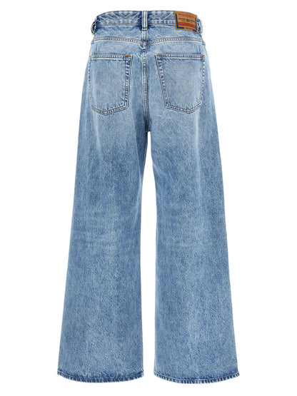 Jeans by Diesel for women in denim cotton blue features an refined tailoring silhouette, showcasing a premium relaxed-fit & wide with a low rise and long cut for a refined tailoring look.