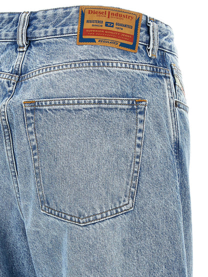 Jeans by Diesel for women in denim cotton blue presents a refined pantology silhouette, artfully defined by a refined pantology relaxed-fit & wide, long, and a sophisticated low rise.