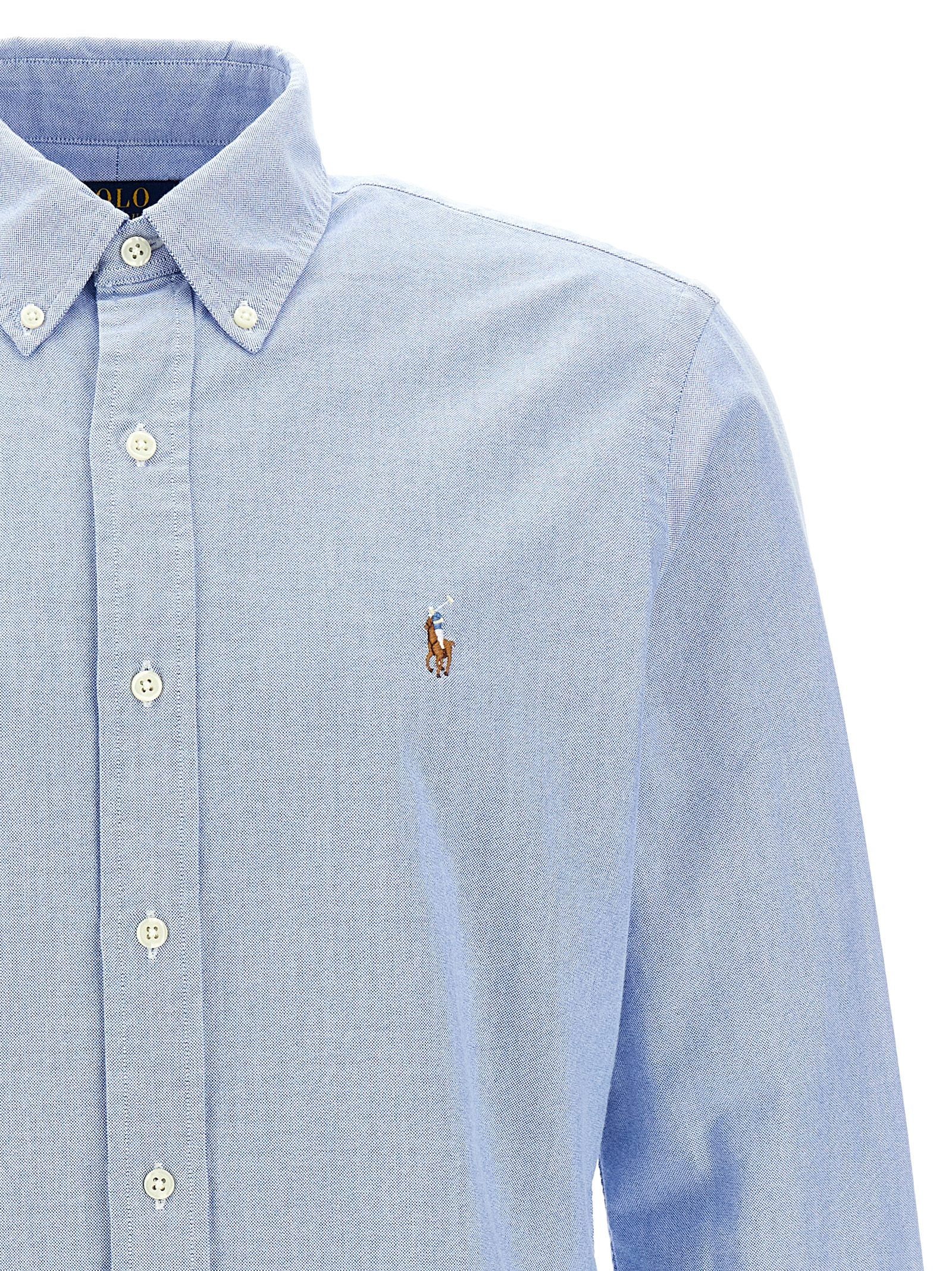 Shirt by Polo Ralph Lauren for men in cotton light-blue showcases a sharp silhouette, elegantly detailed with a sharp and sharp .