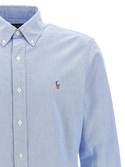 Shirt by Polo Ralph Lauren for men in cotton light-blue showcases a sharp silhouette, elegantly detailed with a sharp and sharp .