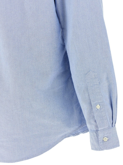 Shirt by Polo Ralph Lauren for men in cotton light-blue presents a discerning silhouette, showcasing a sophisticated and for a truly discerning finish.