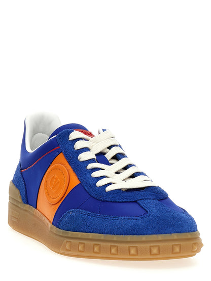 Sneakers by Valentino Garavani for men in bos taurus calfskin leather blue & signature presents a sumptuous silhouette, artfully capturing the essence of the V Logo Men's Low Top Bos Taurus Calfskin Leather Sneakers with its sumptuous low-top style design.