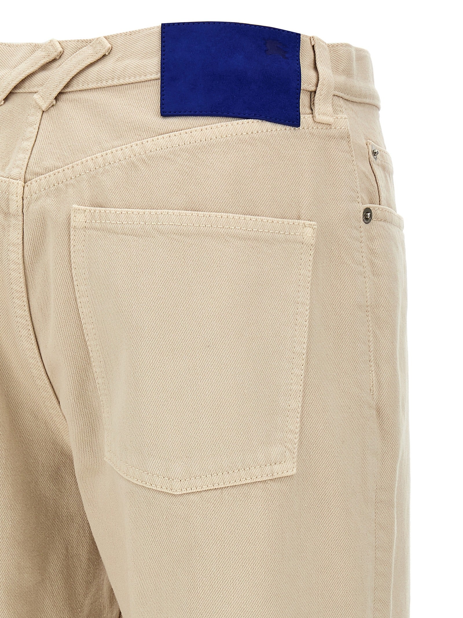 Jeans by Burberry for women in denim cotton & suede leather beige presents a tailored silhouette, showcasing a tailored straight-leg and long cut with a refined for a truly tailored aesthetic.
