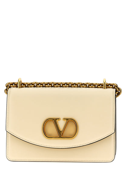 2-in-1 Shoulder & Crossbody Flap Bag by Valentino Garavani for women in calfskin leather white & signature features a effortless chic silhouette with a secure flap & magnetic, ample , and versatile crossbody-strap & shoulder-strap for a effortless chic finish.