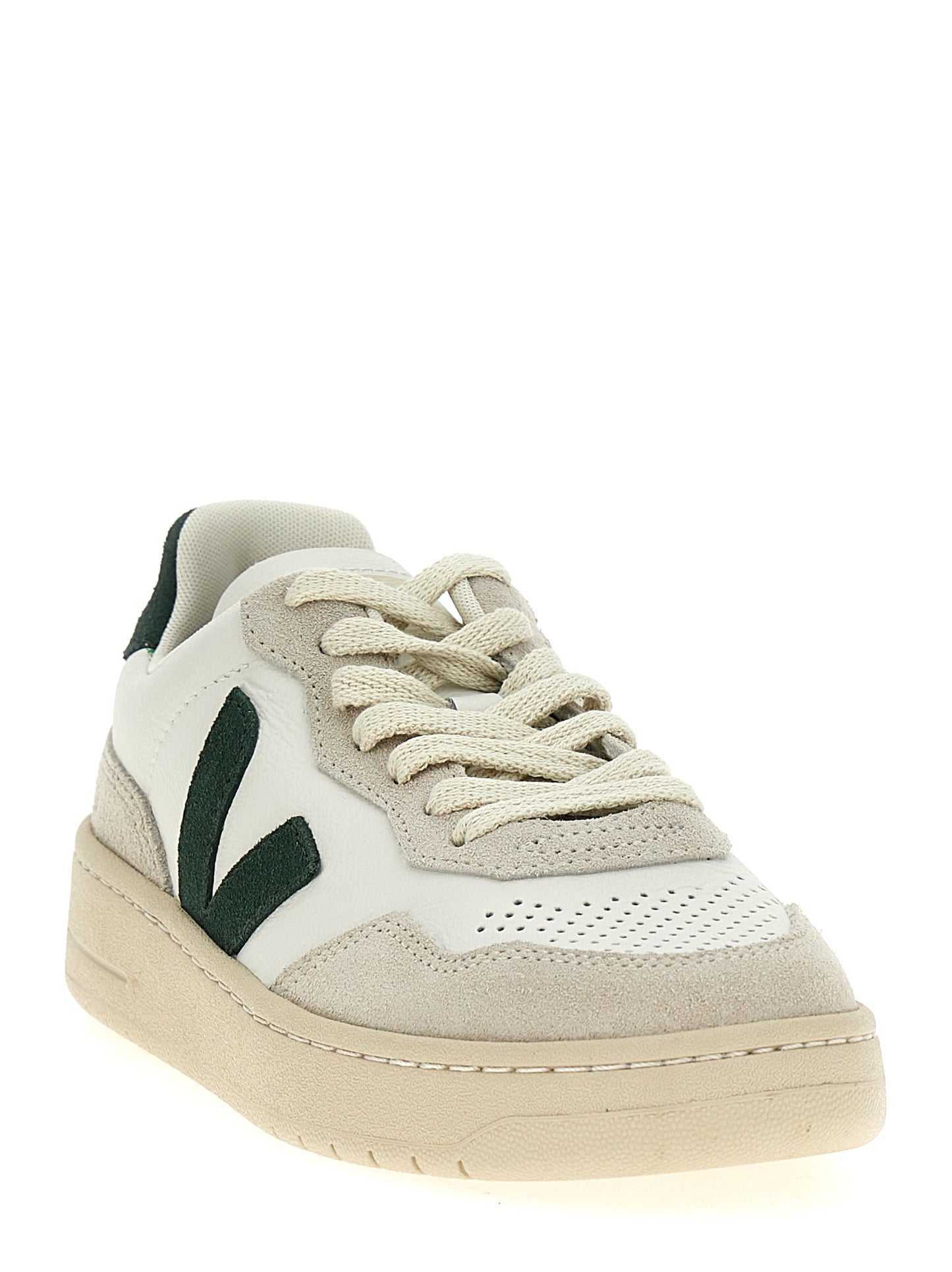 Sneakers by Veja for women in suede leather & rubber bicolour & green presents a sumptuous silhouette, artfully capturing the essence of the Women's Low Top Suede Leather & Rubber Sneakers with its sumptuous low-top style design.