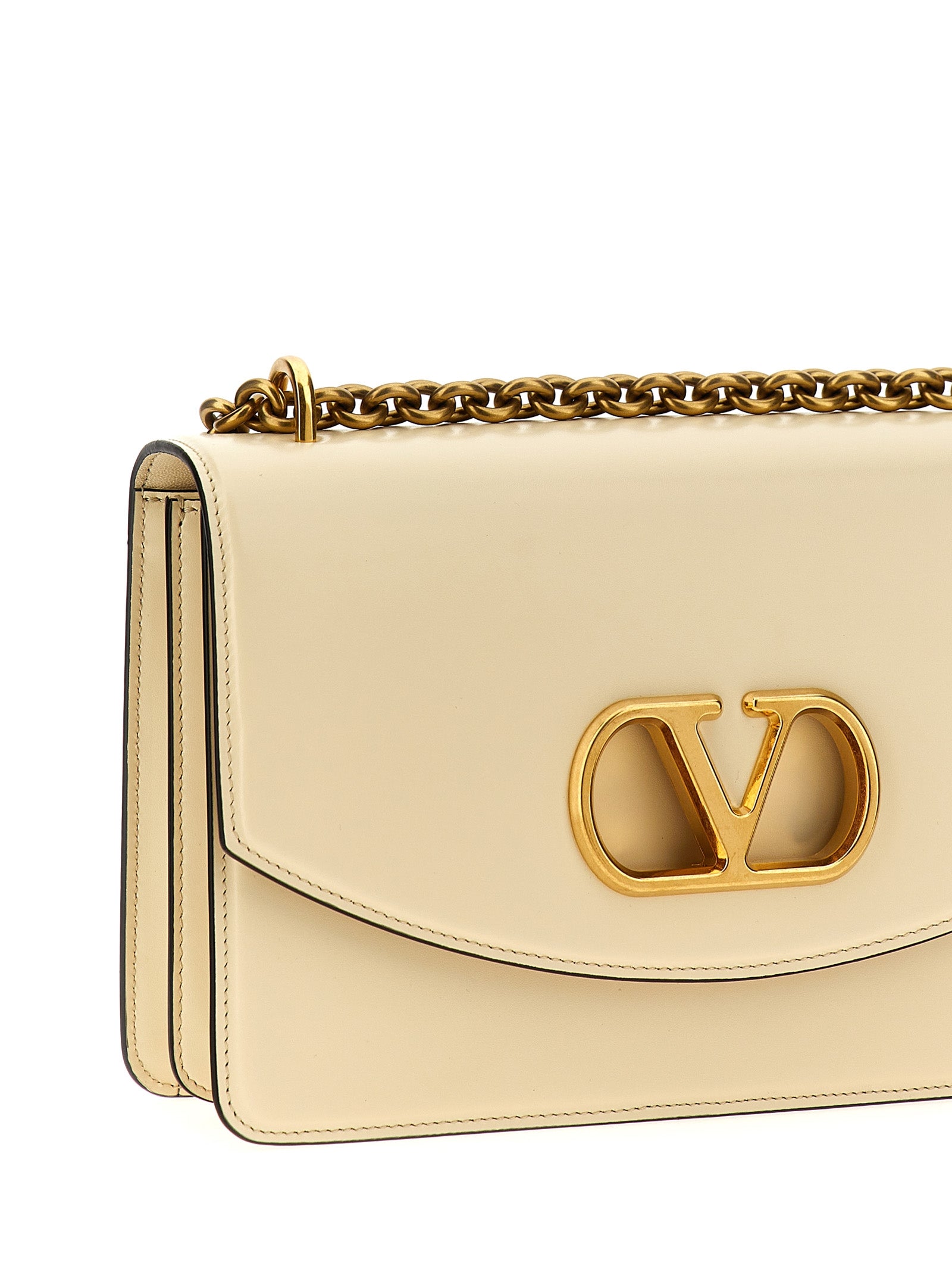 2-in-1 Shoulder & Crossbody Flap Bag by Valentino Garavani for women in bos taurus nappa & suede calf leather white & signature presents a versatile silhouette, showcasing a secure flap & magnetic and versatile with versatile crossbody-strap & shoulder-strap for a sophisticated look.