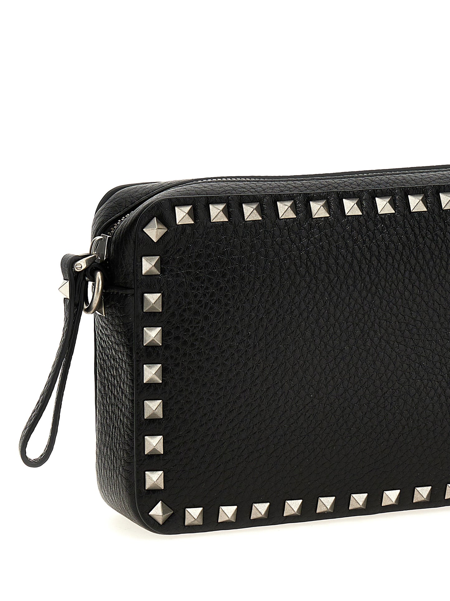 Crossbody Messenger Bag by Valentino Garavani for men in calfskin leather black features an fashionable Rockstud Calfskin Leather Crossbody Messenger Bag design with a fashionable zipper, ample , and versatile crossbody-strap, shoulder-strap & adjustable-strap for a sophisticated finish.