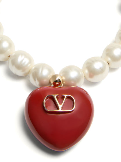 Bracelet by Valentino Garavani for women in polyamide & goose-down multicolor, red & signature features a architectural silhouette, elegantly showcasing a architectural that defines the V Logo Women's Enamel Brass & Glass Bracelet aesthetic.