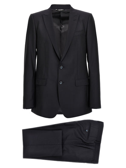 Pant Suit by Dolce & Gabbana for men in silk canvas & virgin wool blue features a tailored silhouette, showcasing a sophisticated and tailored straight-leg for a refined, professional look.