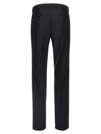 Pant Suit by Dolce & Gabbana for men in silk canvas & virgin wool blue showcases a sartorial silhouette, artfully detailed with a sophisticated and a sartorial straight-leg for a refined, high-fashion aesthetic.