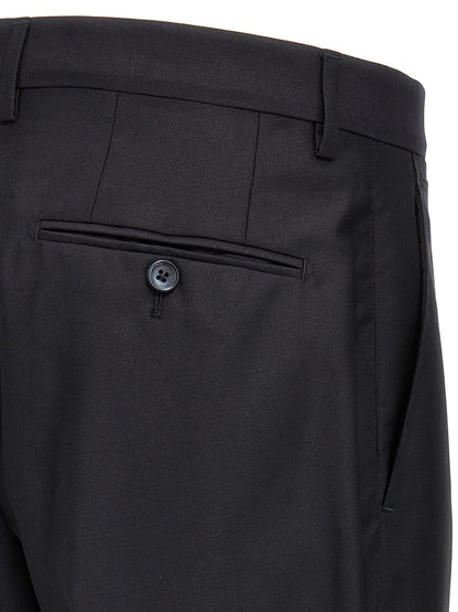 Pant Suit by Dolce & Gabbana for men in silk canvas & virgin wool blue presents a nuanced silhouette, showcasing a nuanced and nuanced straight-leg for an elevated aesthetic.