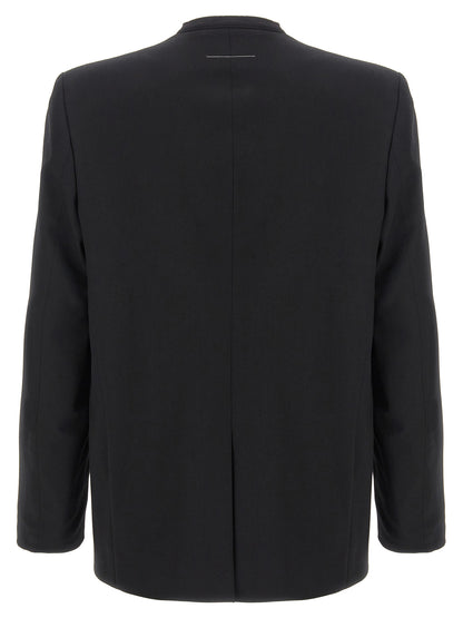 Blazer by MM6 Maison Margiela for men in polyester & virgin wool black & white presents a distinguished silhouette, detailed with a distinguished and distinctive for a truly sophisticated finish.