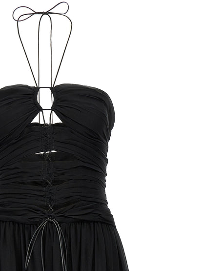 Dress by Tom Ford for women in silk black presents a sinuous silhouette, showcasing a sophisticated and detailed with a sinuous maxi long for a refined finish.