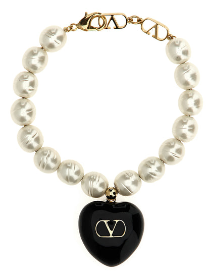 This Bracelet by Valentino Garavani for women in calfskin leather and black & signature showcases a exquisite silhouette, highlighting the intricate from the V Logo Women's Enamel Brass & Glass Bracelet collection for a exquisite aesthetic.