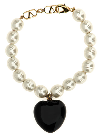 Bracelet by Valentino Garavani for women in calfskin leather black & signature features a architectural silhouette, elegantly showcasing a architectural that defines the V Logo Women's Enamel Brass & Glass Bracelet aesthetic.