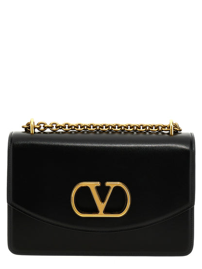 Shoulder Flap Bag by Valentino Garavani for women in calfskin leather black & signature features a effortless sophistication silhouette, secured by a flap & magnetic with ample and versatile shoulder-strap for a effortless sophistication finish.