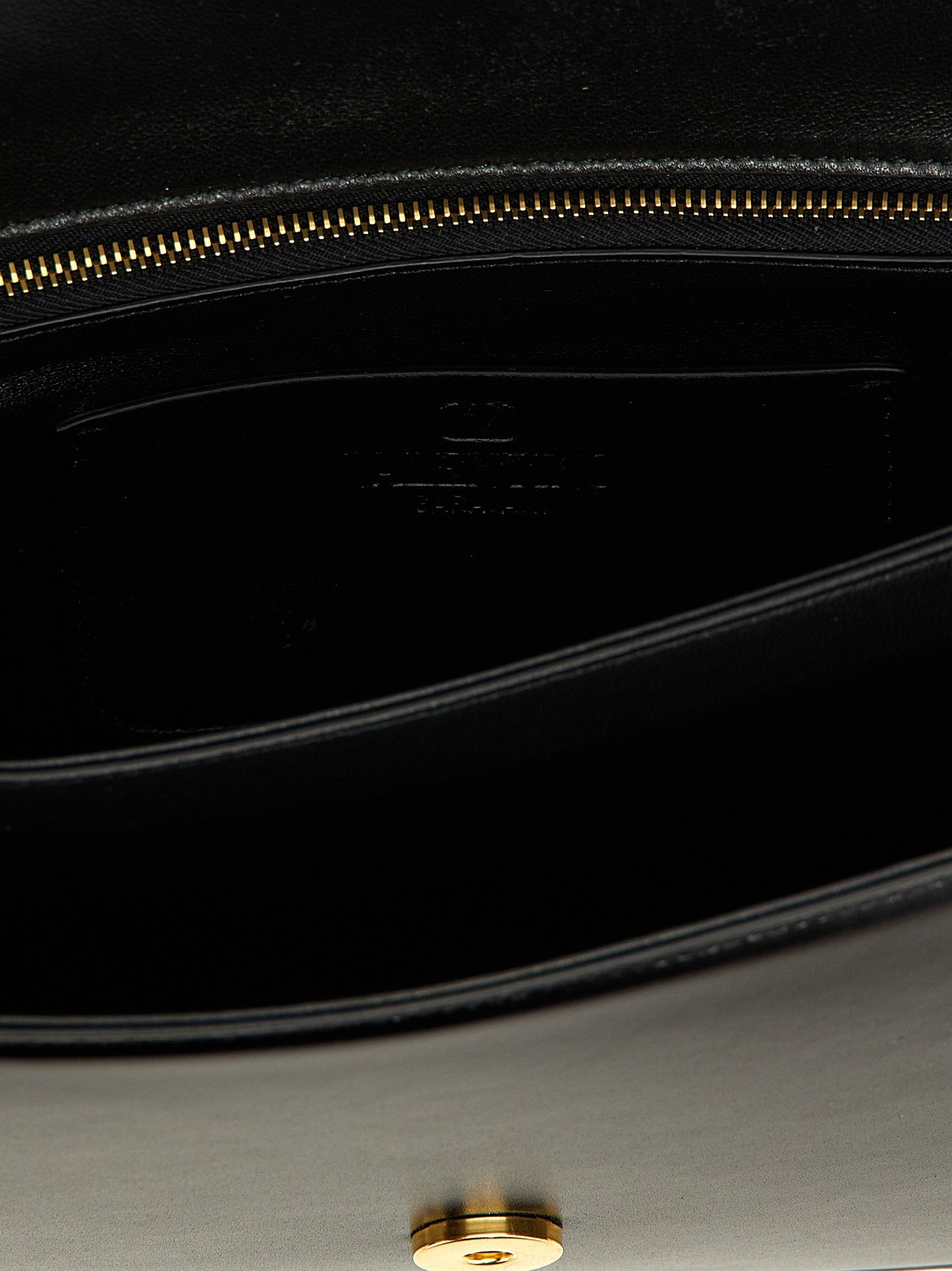 Shoulder Flap Bag by Valentino Garavani for women in calfskin leather black & signature presents a versatile silhouette, showcasing a secure flap & magnetic and versatile with versatile shoulder-strap for a sophisticated look.