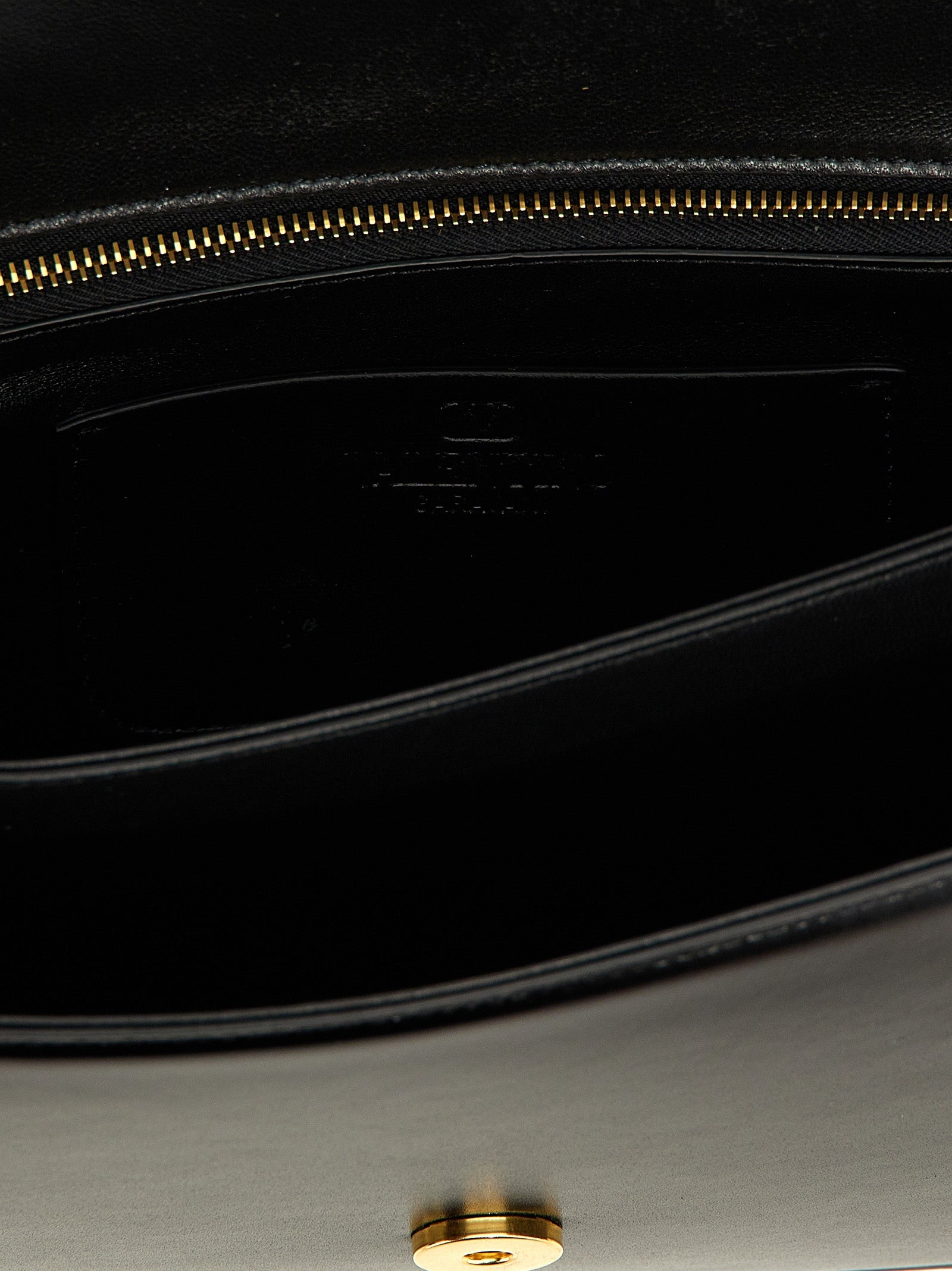 Shoulder Flap Bag by Valentino Garavani for women in calfskin leather black & signature presents a versatile silhouette, showcasing a secure flap & magnetic and versatile with versatile shoulder-strap for a sophisticated look.