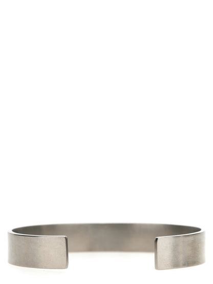 Bracelet by Maison Margiela for women in suede calfskin leather silver features an svelte silhouette, showcasing the svelte bangle bracelet design of the Women's Bangle Silver Bracelet for a sophisticated, svelte look.