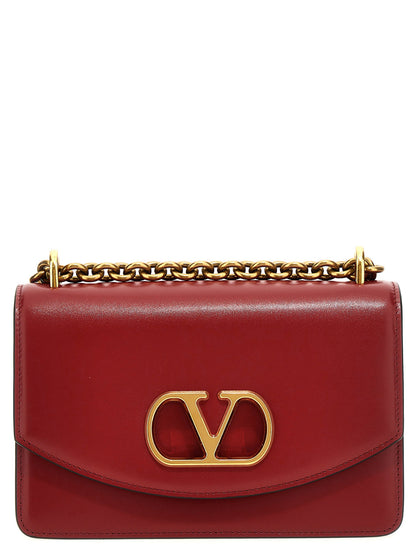 2-in-1 Shoulder & Crossbody Flap Bag by Valentino Garavani for women in calfskin leather multicolor, red & signature features a effortless chic silhouette with a secure flap & magnetic, ample , and versatile crossbody-strap & shoulder-strap for a effortless chic finish.