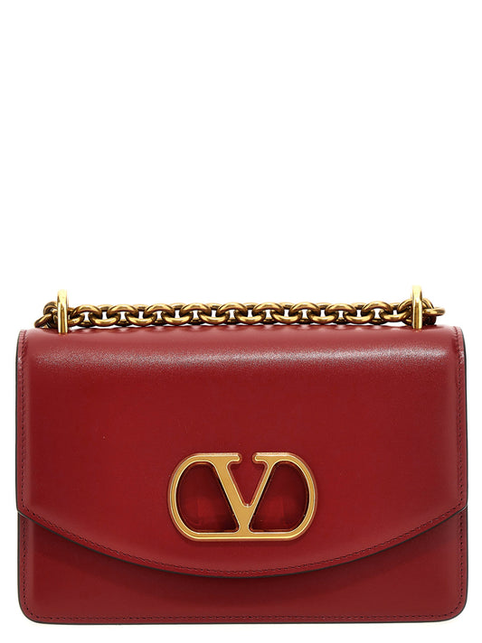 2-in-1 Shoulder & Crossbody Flap Bag by Valentino Garavani for women in calfskin leather multicolor, red & signature features a effortless chic silhouette with a secure flap & magnetic, ample , and versatile crossbody-strap & shoulder-strap for a effortless chic finish.