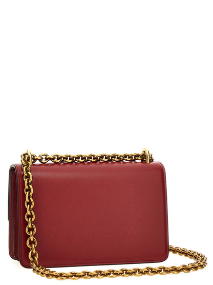 2-in-1 Shoulder & Crossbody Flap Bag by Valentino Garavani for women in calfskin leather multicolor, red & signature features a distinguished silhouette, showcasing a secure flap & magnetic and distinguished with versatile crossbody-strap & shoulder-strap for a distinguished finish.