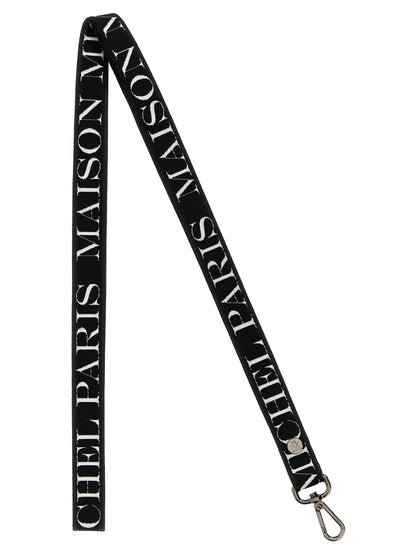 This Keychain by Maison Michel for women in denim cotton and bicolour, black & white showcases a couture-inspired aesthetic, meticulously highlighting the and with a finish.