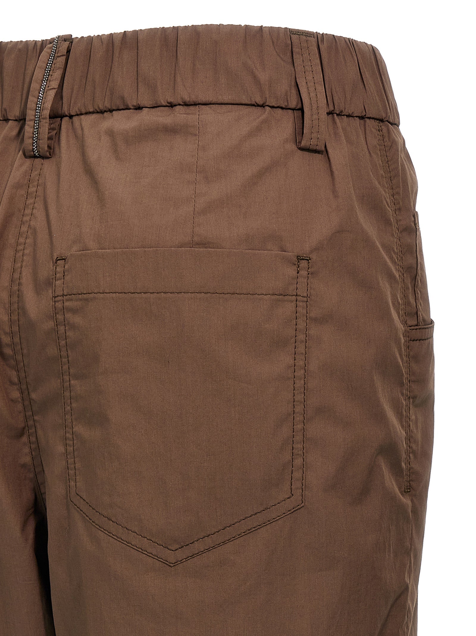 Casual Pants by Brunello Cucinelli for women in cotton brown presents a tailored silhouette, showcasing a tailored straight-leg and long cut with a refined for a truly tailored aesthetic.