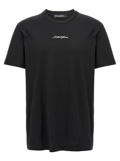 T-Shirt by Dolce & Gabbana for men in cotton black showcases a fashionable silhouette, elegantly detailed with a fashionable short-sleeve and crew neckline for a sophisticated, high-fashion look.