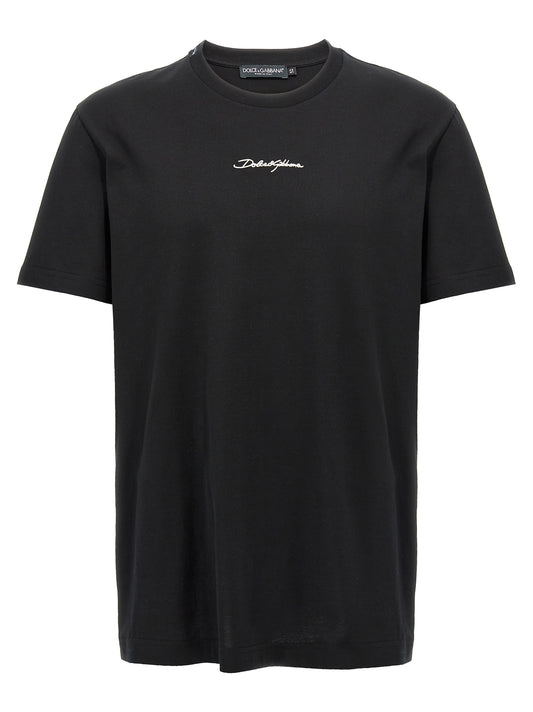 T-Shirt by Dolce & Gabbana for men in cotton black showcases a fashionable silhouette, elegantly detailed with a fashionable short-sleeve and crew neckline for a sophisticated, high-fashion look.