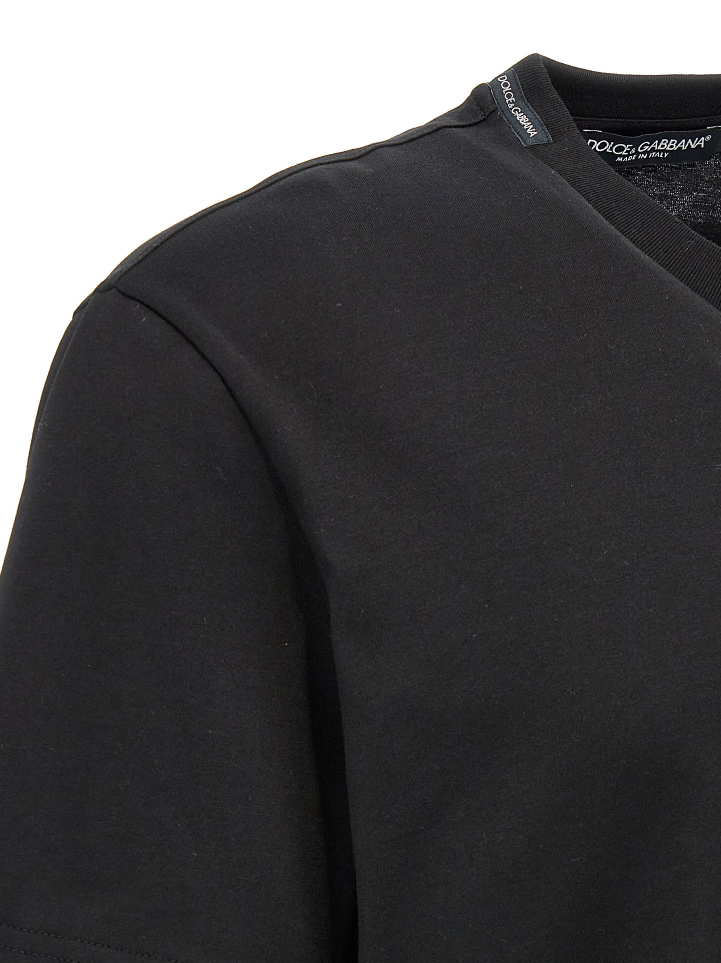 T-Shirt by Dolce & Gabbana for men in cotton black features an edgy silhouette, meticulously detailed with a sophisticated and for a truly edgy finish.