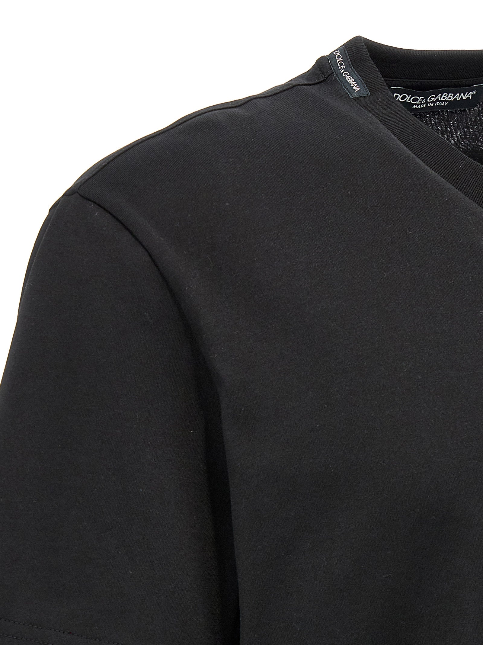 T-Shirt by Dolce & Gabbana for men in cotton black features an edgy silhouette, meticulously detailed with a sophisticated and for a truly edgy finish.