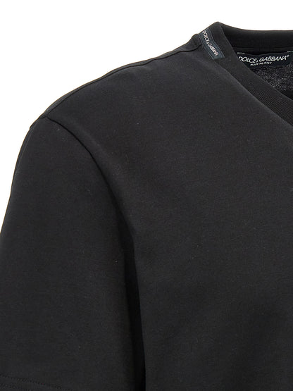 T-Shirt by Dolce & Gabbana for men in cotton black features an edgy silhouette, meticulously detailed with a sophisticated and for a truly edgy finish.