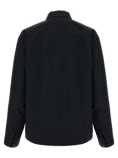 Windbreaker Jacket by Herno for men in polyester black showcases a urban chic silhouette, detailed with a urban chic and functional windproof & pockets for a polished finish.