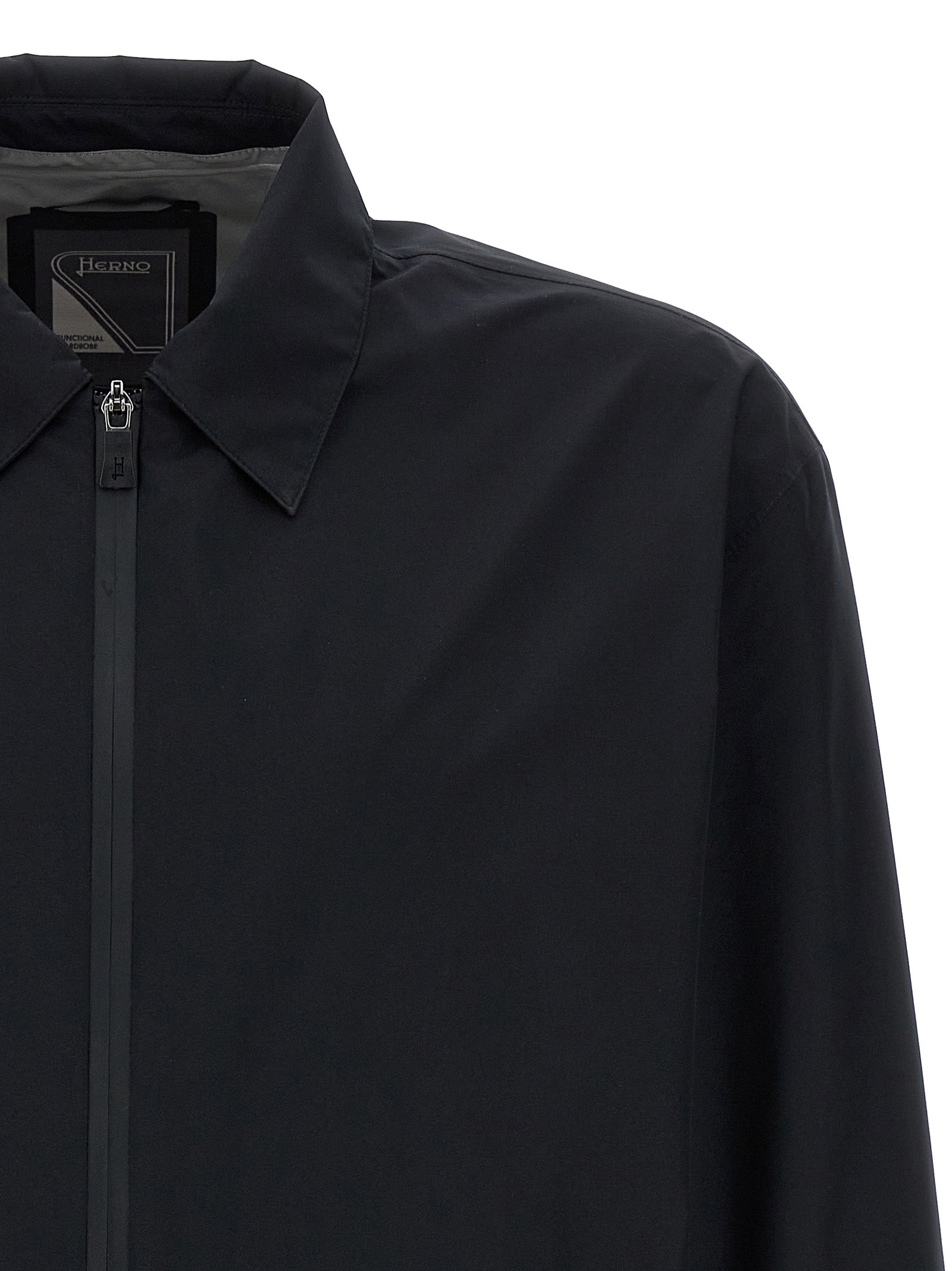 Windbreaker Jacket by Herno for men in polyester black features an stylish silhouette, showcasing a sophisticated and performance-driven windproof & pockets for a premium, stylish look.