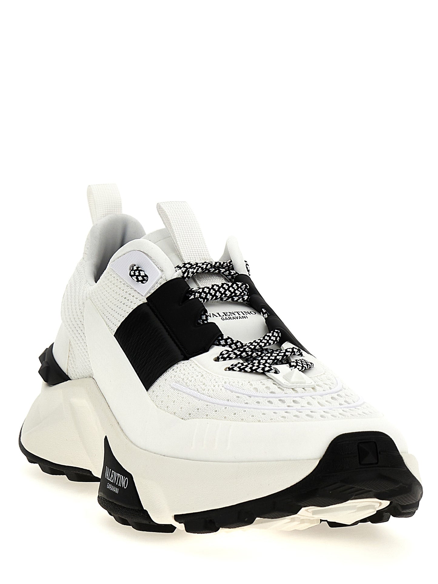 Athletic Sneakers by Valentino Garavani for men in calfskin leather bicolour, black & white showcases a architectural silhouette, artfully capturing the essence of the Men's Athletic Calfskin Leather Sneakers with its signature architectural athletic style construction.