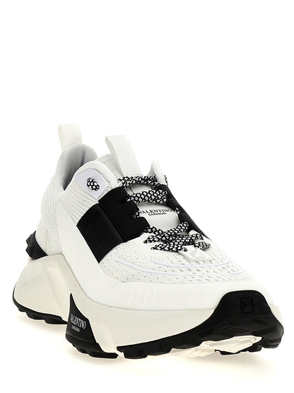 Athletic Sneakers by Valentino Garavani for men in calfskin leather bicolour, black & white showcases a architectural silhouette, artfully capturing the essence of the Men's Athletic Calfskin Leather Sneakers with its signature architectural athletic style construction.