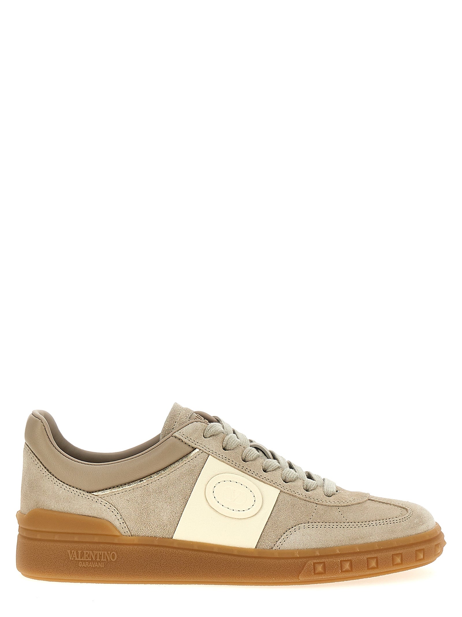 Sneakers by Valentino Garavani for women in bos taurus calfskin leather beige & signature features a chic design, perfectly showcasing the chic low-top style of this V Logo Women's Low Top Bos Taurus Calfskin Leather Sneakers.