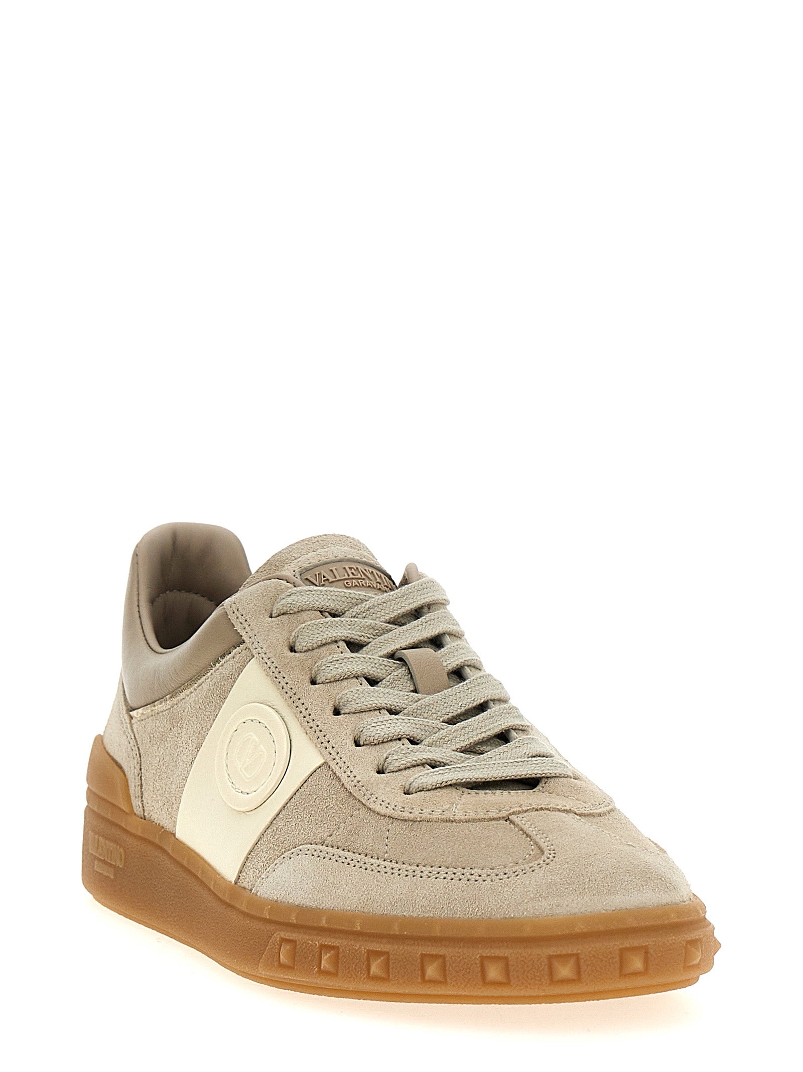 Sneakers by Valentino Garavani for women in bos taurus calfskin leather beige & signature presents a on trend silhouette from the V Logo Women's Low Top Bos Taurus Calfskin Leather Sneakers collection, showcasing a on trend low-top style for an elevated aesthetic.