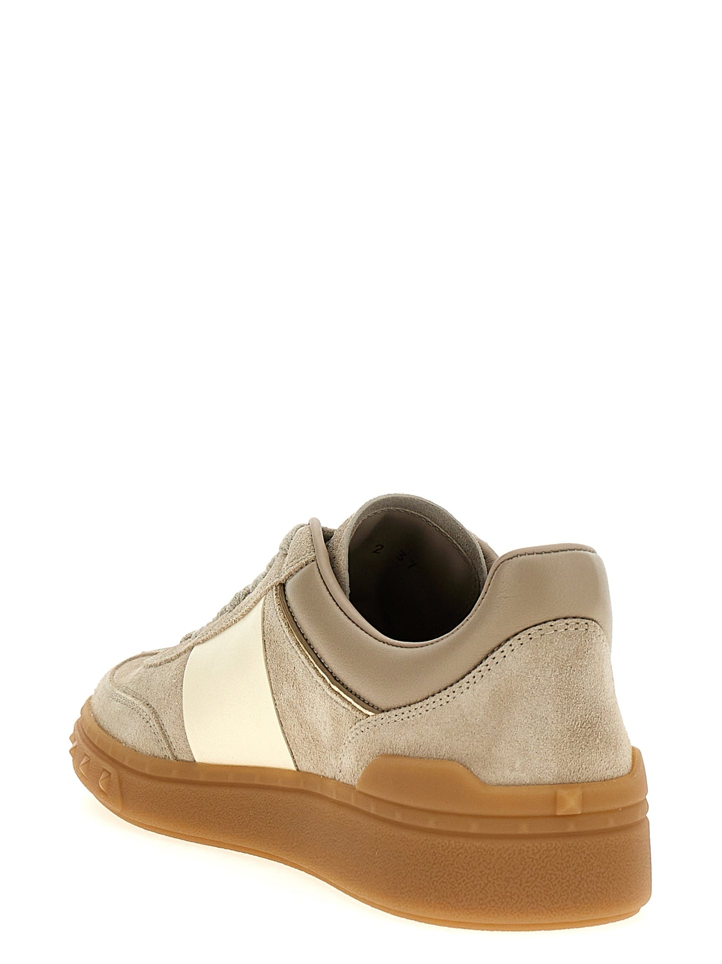 Sneakers by Valentino Garavani for women in bos taurus calfskin leather beige & signature presents a sumptuous silhouette, artfully capturing the essence of the V Logo Women's Low Top Bos Taurus Calfskin Leather Sneakers with its sumptuous low-top style design.