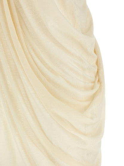 Dress by Rick Owens for unisex in cotton beige & transparent features a dramatic silhouette, showcasing an elegant and that flows into a dramatic short.