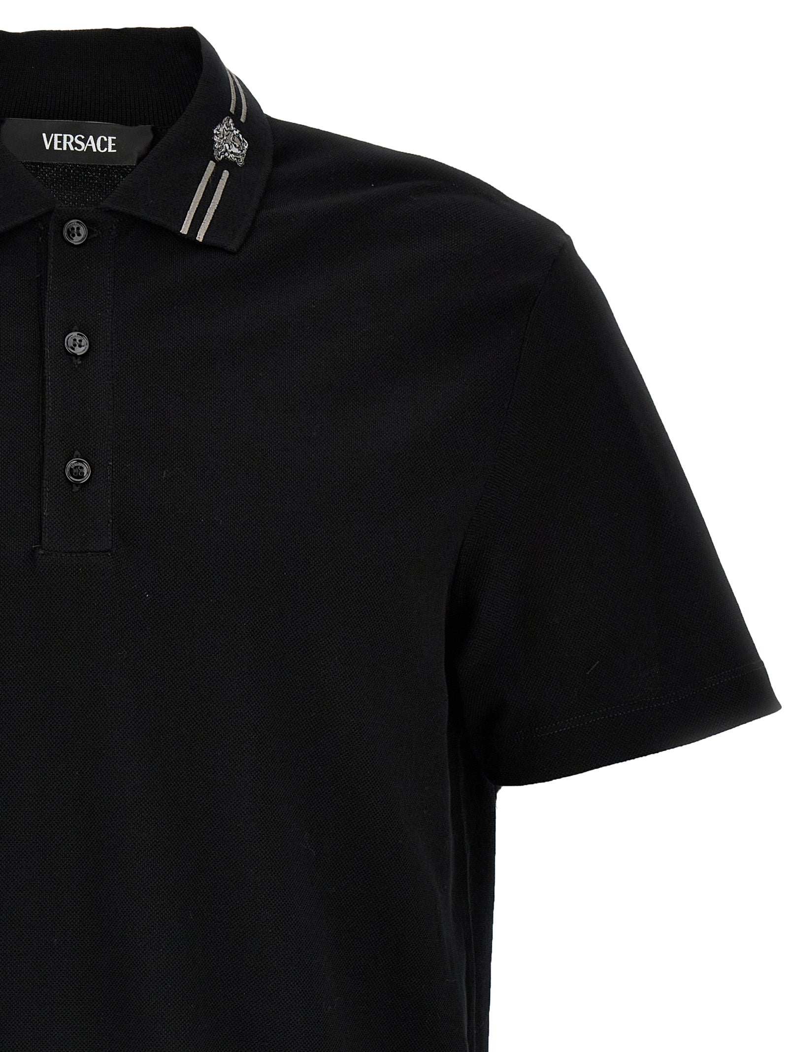 Polo Shirt by Versace for men in cotton black & striped features a eye catching silhouette, showcasing a refined and for a eye catching finish.