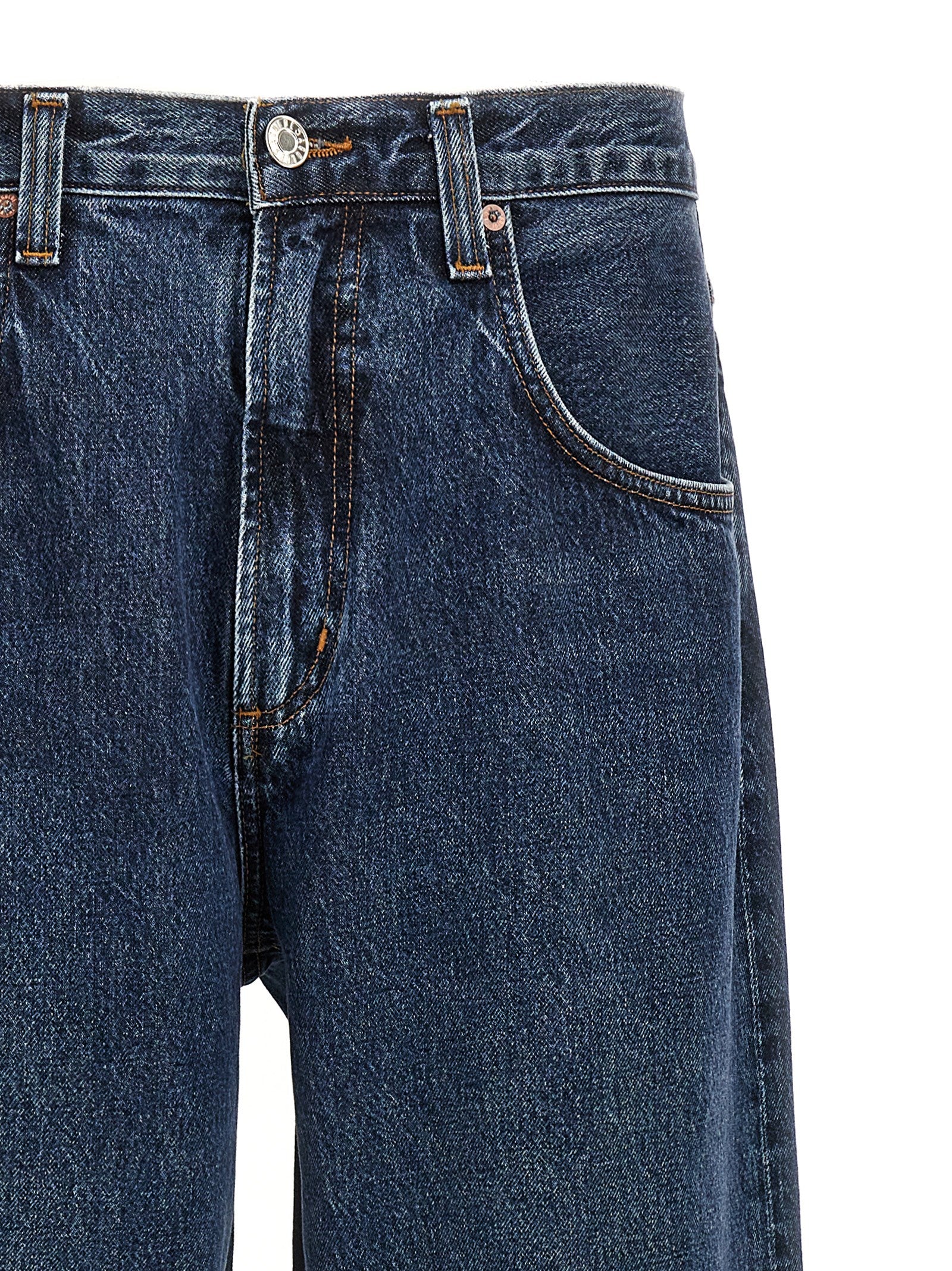Jeans by Agolde for men in organic cotton denim blue presents a tailored silhouette, showcasing a tailored wide and long cut with a refined for a truly tailored aesthetic.