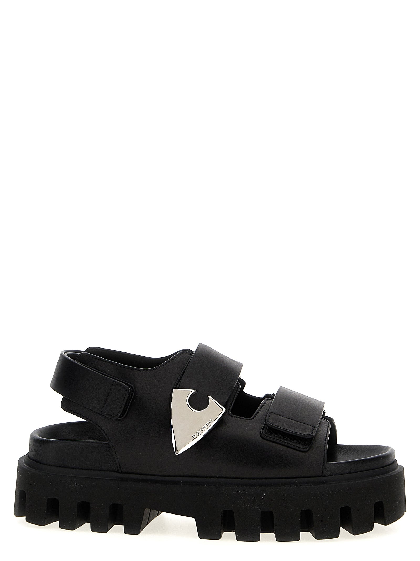 Flat Sandals by Alexander McQueen for women in bos taurus calf leather black showcases a sculptural silhouette as Women's Bos Taurus Calf Leather Flat Sandals, defined by a sculptural flat and sculptural for a sculptural look.