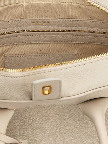 Handbag by Golden Goose for women in viscose & synthetic fur white features a ornamental silhouette, showcasing a secure zipper, ample , and ornamental shoulder-strap, adjustable-strap & handle for a sophisticated look.